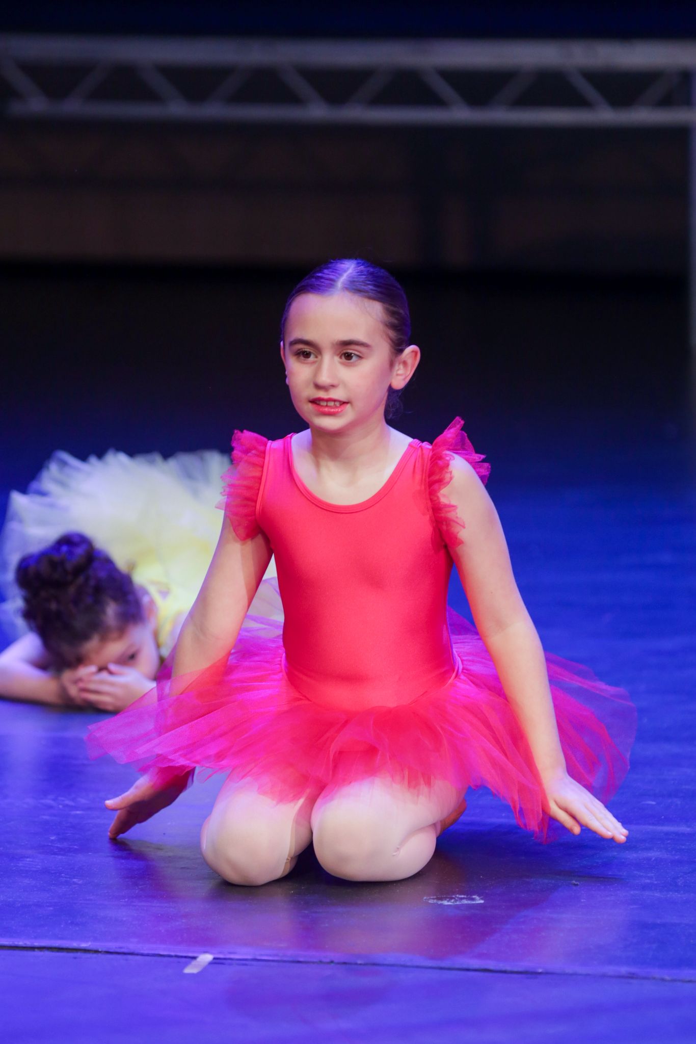 Young T's Studios dancer performing on stage